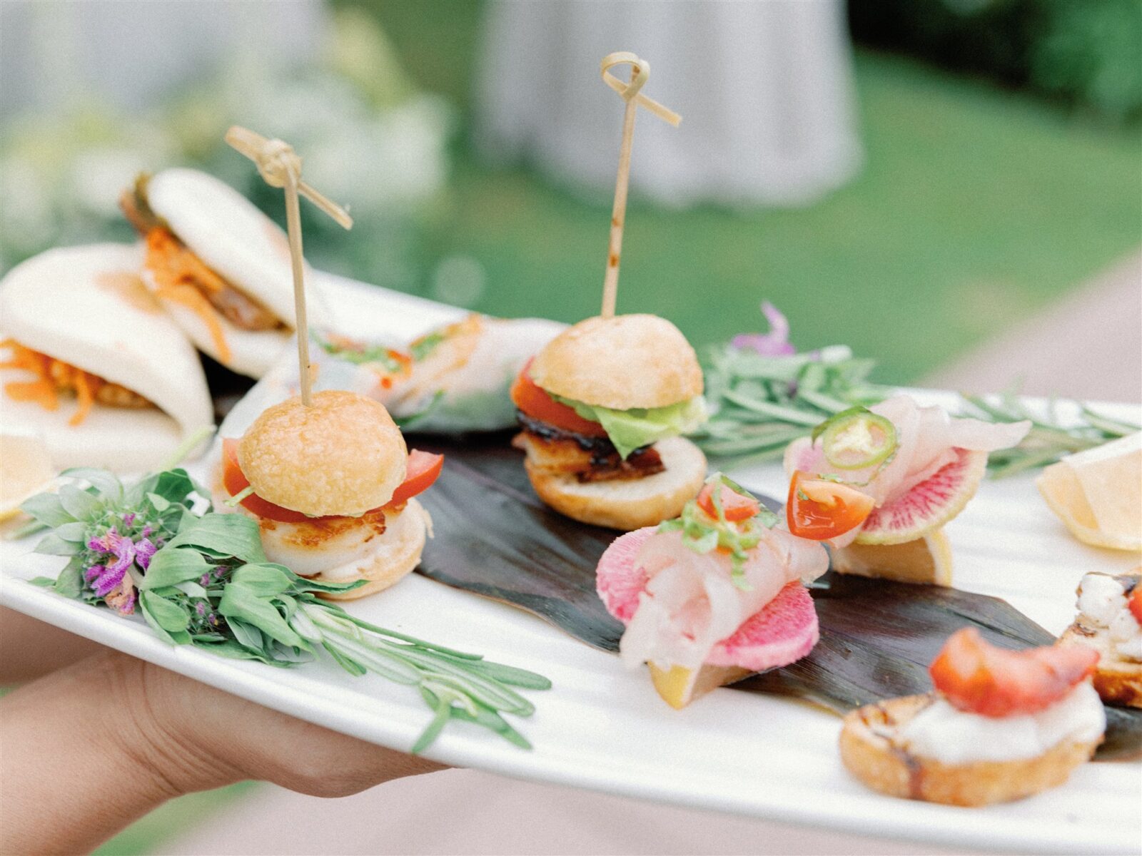 Tray passed appetizers at wedding cocktail hour