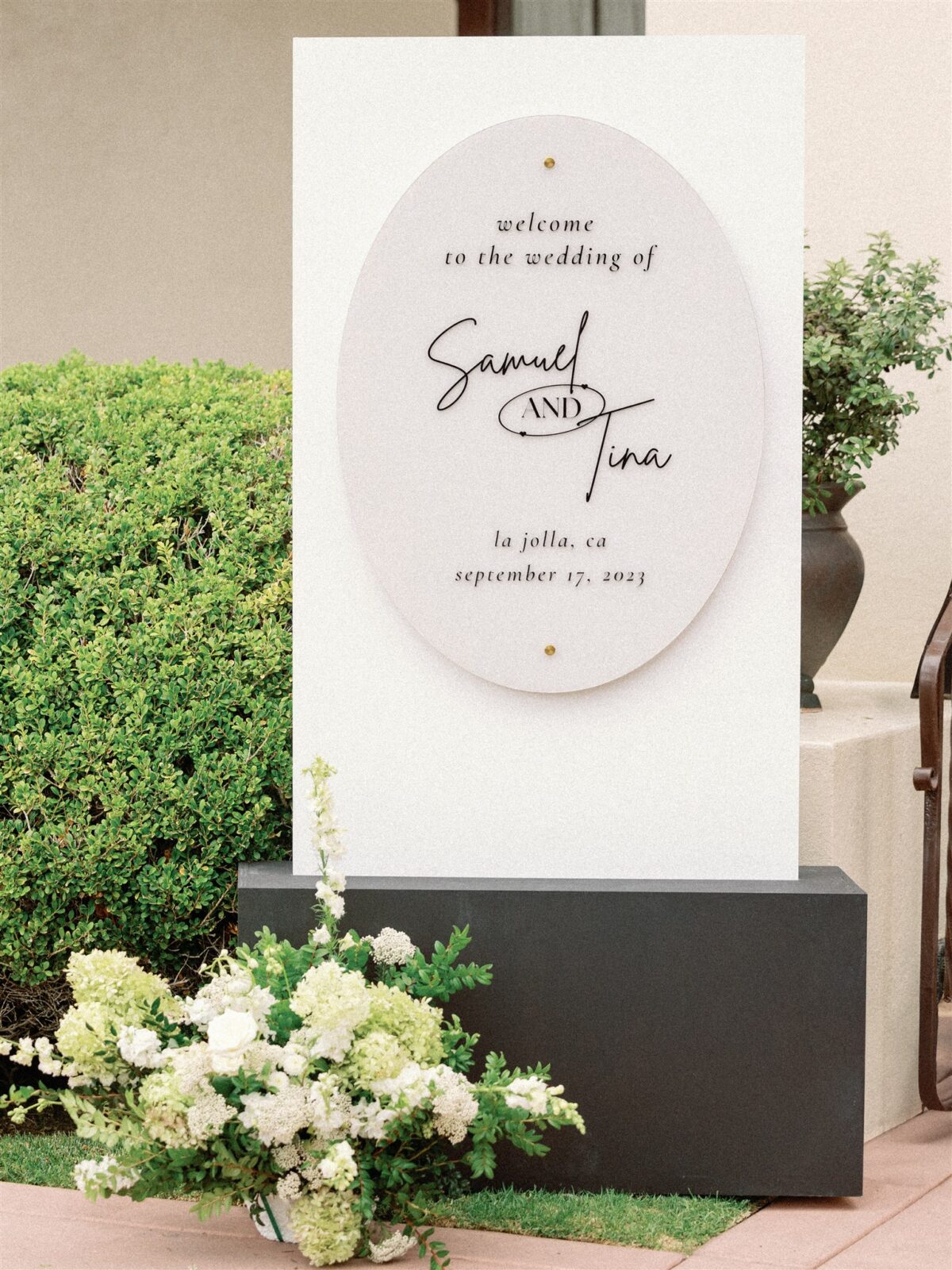 Modern acrylic wedding welcome sign at La Jolla Women's Club 