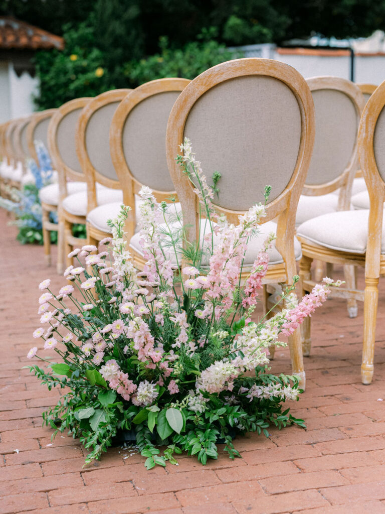 Wedding ceremony aisle flowers at the Darlington House