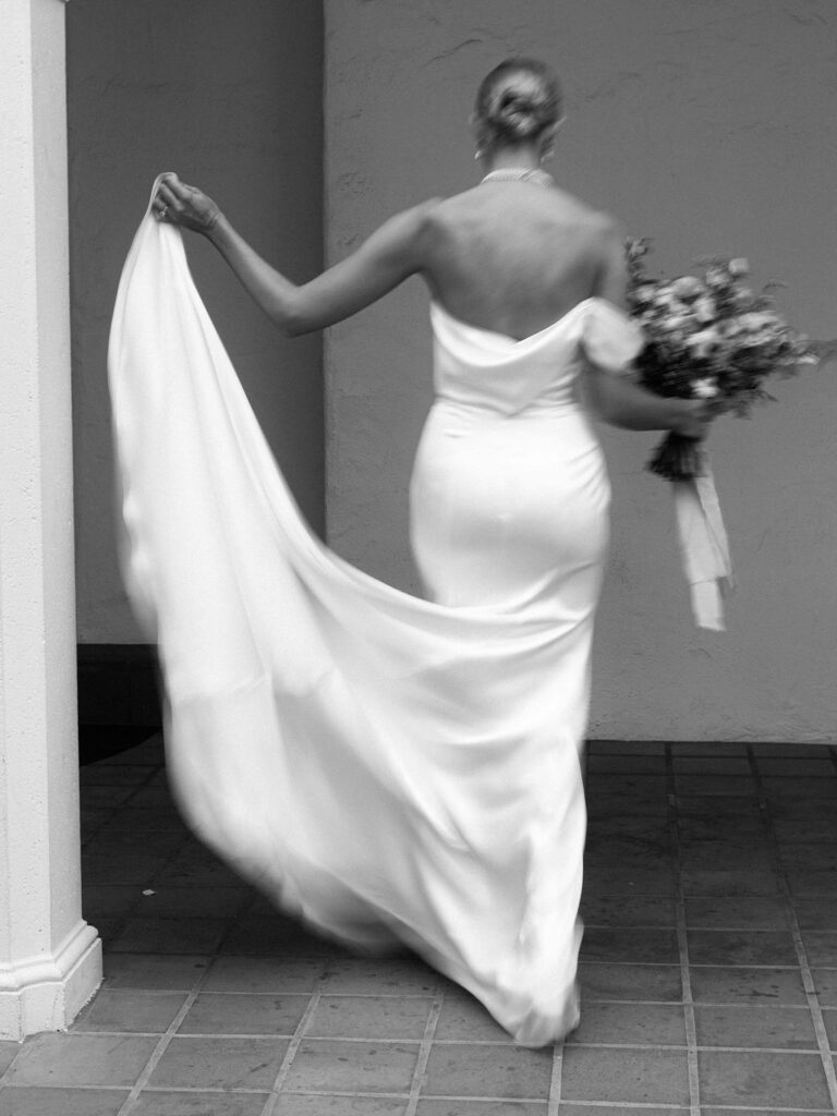 black and white photo of a bride in her dress at the Darlington House