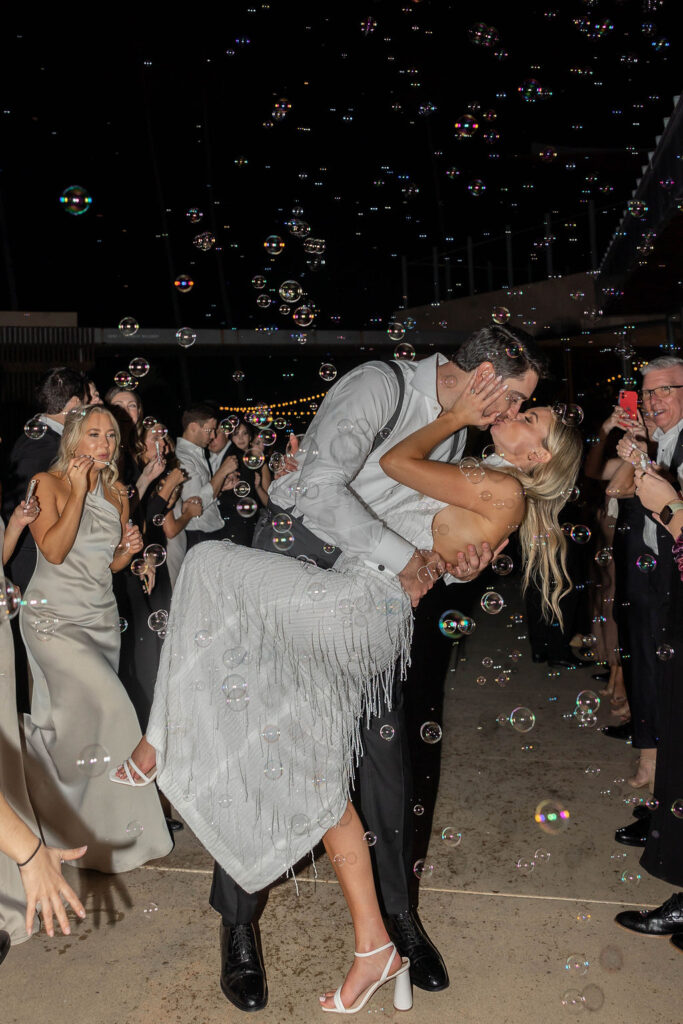 bride and groom bubble grand exit at Scripps Seaside Forum