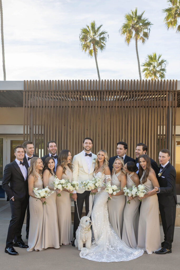 Bridal party posing at Scripps Seaside Forum