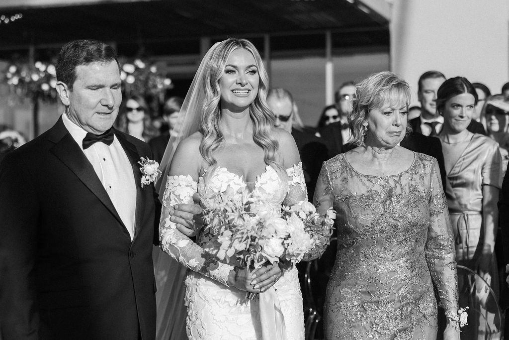 Bride walking down the aisle at Scripps Seaside Forum