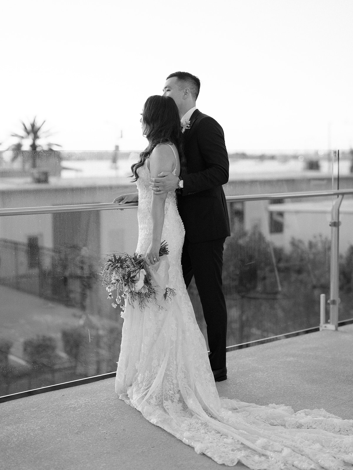 Black and white photo of a bride and groom at the Lane