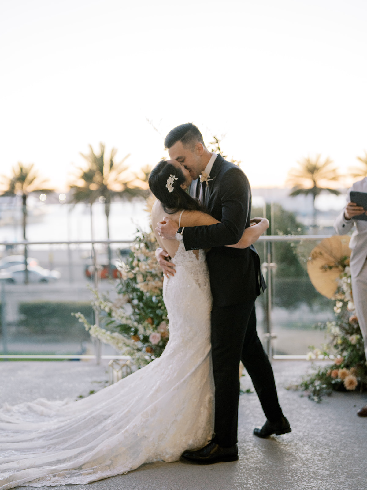 Bride and groom kissing at the Lane in San Diego