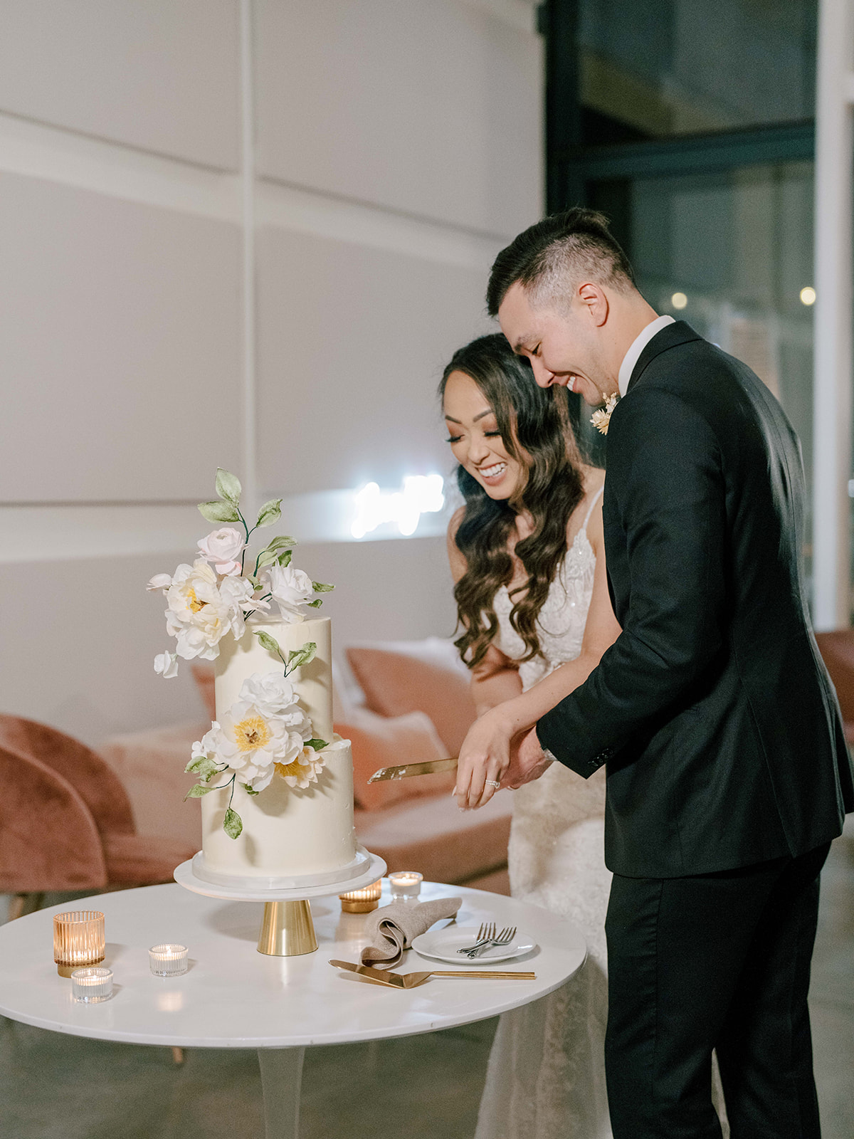 bride and groom cutting their cake at the Lane